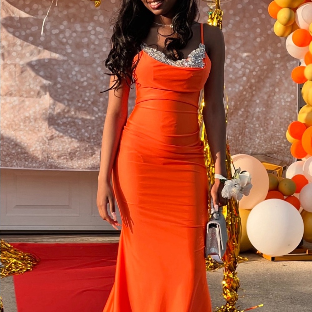 Beautiful prom dress worn one time only for a few hours. In perfect condition